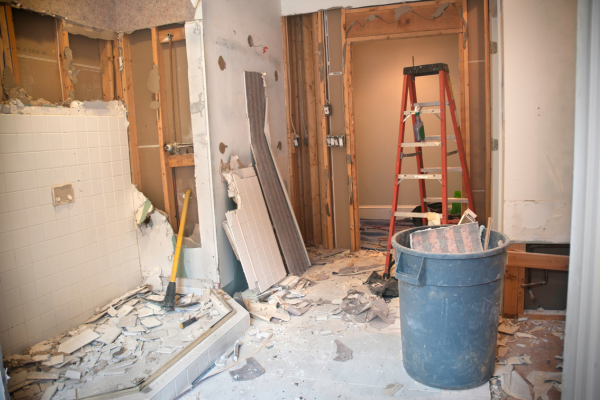 Bathroom demolition in progress during home renovation. Bathroom demolition in progress during home renovation.