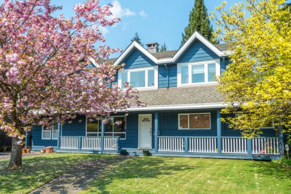 blue house in spring season blue house in spring season